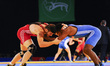 Gilbert Emilie for Mauritius competes against Kushan Sandrage for Sri Lanka at Wrestling a...