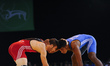 Gilbert Emilie for Mauritius competes against Kushan Sandrage for Sri Lanka at Wrestling a...