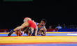 Gilbert Emilie for Mauritius competes against Kushan Sandrage for Sri Lanka at Wrestling a...