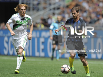 Cristian Ansaldi of Inter player and Davide Biondini of Sassuolo player during the Serie A match between FC Internazionale and US Sassuolo a...
