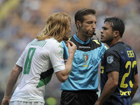 Davide Biondini of Sassuolo player, Davide Massa the referee and Eder of Inter player during the Serie A match between FC Internazionale and...