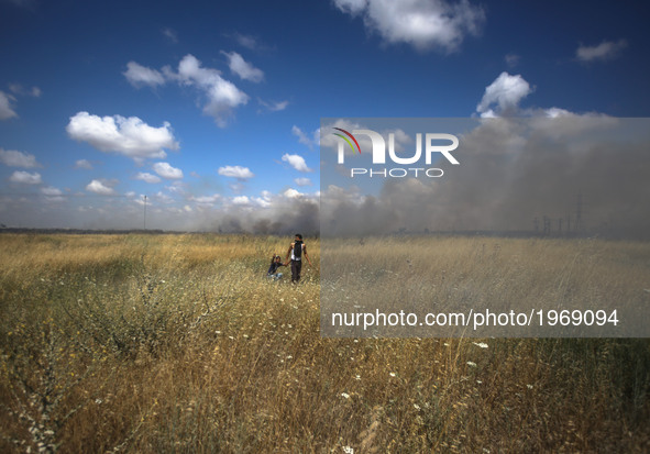 Clashes have broken out between Israeli Forces and protesters in the Gaza strip, near the border with Israel, during a demonstration in soli...