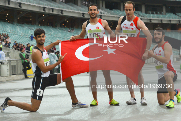Members of the Turkish relay celebrate their Gold medal in Men's 4 x 400 Relay final, during day five of Athletics at Baku 2017 - 4th Islami...
