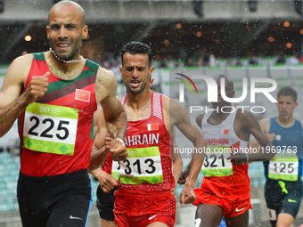 Sadik Mikhou of Bahrain controles the race behind Fouad Elkaam of Morocco in Men's 1500m final, during day five of Athletics at Baku 2017 -...