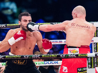 Krzysztof "Diablo" Wlodarczyk of Poland fight against Noel Gevor of Germany during their match IBF Cruiserweight final Eliminator at Poznan...