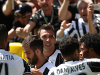 Juventus forward Mario Mandzukic (17) celebrates with his teammates after scoring his goal during the Serie A football match n.37 JUVENTUS -...