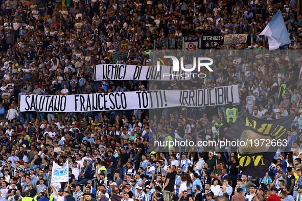 Serie A Lazio v Inter
Lazio supporters with a banner greeting the captain of As Roma Francesco Totti that will retire after the last match...