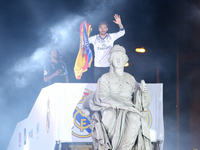 Sergio Ramos of Real Madrid CF salutes from the statue of the godess of Cibeles at Cibeles square after winning the La liga title on May 21,...