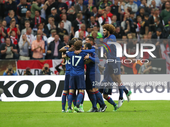 Manchester United's players celebrate with teammate Paul Pogba scoring during the UEFA Europa League final football match Ajax Amsterdam v M...