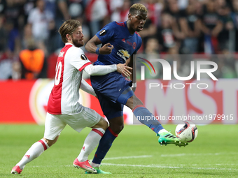 Paul Pogba of Manchester United scores his sides first goal during the UEFA Europa League Final between Ajax and Manchester United at Friend...