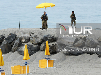 Two soldiers patrolling the coast near the Media Center of the meeting at Taormina, Italy on May 25, 2017.
Leaders of the G7 group of natio...