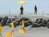 Two soldiers patrolling the coast near the Media Center of the meeting at Taormina, Italy on May 25, 2017.
Leaders of the G7 group of natio...
