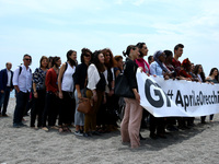 Demonstration organized by the Ngo Action Aid for the campaign 'Oper your ears" directed to the G7 leaders at Taormina, Italy on May 25, 201...