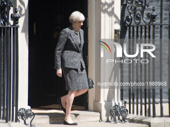 British Prime Minister, Theresa May  leaves Downing Street, to attend the NATO summit in Brussels, London on May 25, 2017.  (
