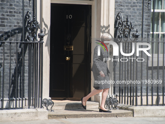 British Prime Minister, Theresa May  leaves Downing Street, to attend the NATO summit in Brussels, London on May 25, 2017.  (
