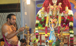 Tamil Hindu priest performs special prayers honouring Lord Murugan during a festival at a...