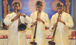 Tamil Hindu musicians perform on the nadaswaram (nadhaswaram) during a festival honouring...