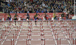 Athletes compete in the 110m hurdles at the 20th Commonwealth games in Hamden Park in Glas...