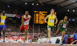 Athletes compete in the 110m hurdles at the 20th Commonwealth games in Hamden Park in Glas...