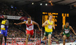 Athletes compete in the 110m hurdles at the 20th Commonwealth games in Hamden Park in Glas...