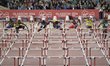Athletes compete in the 110m hurdles at the 20th Commonwealth games in Hamden Park in Glas...