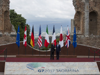  japanese prime minister Shinzo Abe shakes hands wit italian prime Minister Paolo Gentiloni as he arrives at the Ancient Theatre of Taormina...