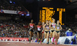 Women Athletes compete in the 1500m race at the 20th Commonwealth games in Hamden Park in...