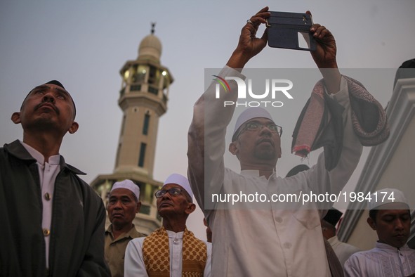 Indonesian muslim hold a Rukyatul Hilal to see the new crescent moon that determines the start of Ramadan in Jami Musyari'in Mosque, Jakarta...