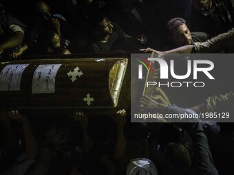 Funeral service of Christians who were killed during a bus attack, at Abu Garnous Cathedral in Minya, Egypt, Friday, May 26, 2017. Egyptian...