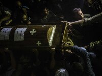 Funeral service of Christians who were killed during a bus attack, at Abu Garnous Cathedral in Minya, Egypt, Friday, May 26, 2017. Egyptian...