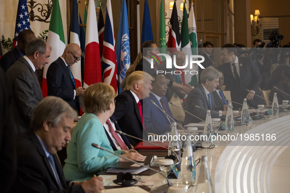 German Chancellor Angela Merkel (L),U.S. President Donald Trump (2L), italian Prime Minister Paolo Gentikoni (2R) and French President Emman...