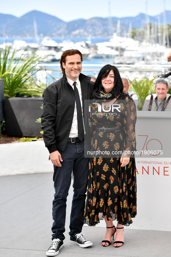 Actor Joaquin Phoenix (L) and director Lynne Ramsay of the film "You Were Never Really Here" pose for a photocall in Cannes, France on May 2...