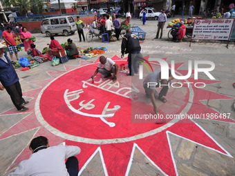 Supporters of CPN-UML decorating the streets of Katmandu for welcoming new mayor of the Kathmandu Metropolitan City Bidya Sundar Shakya on S...