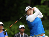 Shanshan Feng of China tees off on the 8th tee during the final round of the LPGA Volvik Championship at Travis Pointe Country Club, Ann Arb...