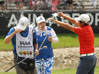 Shanshan Feng of China is showered with water by Haru Nomura of Japan after winning the Volvik Championship during the final round of the Vo...
