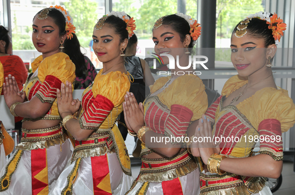 Sri Lankan girls from the Pratibha Dance and Music Academy perform a traditional dance during the festival of Vesak in Mississauga, Ontario,...