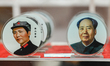 Mao Zedong memorabilia on display for sale, seen inside a shop with souvenirs, in Shaoshan...