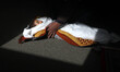The body of 3-year-old Hala Abu Sebakha lies in a mosque during her funeral in Gaza Strip,...