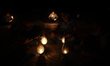 Palestinian boys study on light of gasoline lamps during a vigil against the ongoing block...