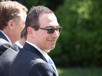 Steven Mnuchin, U.S. Secretary of the Treasury, was in attendance for President Trump's announcement that the United States is withdrawing f...