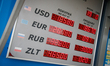 Exchange rates are seen for US dollars, Euros, Belarussian roubles and zlotys are seen at...