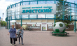 People are seen walking past the entrance of regional sports complex Brestsky in Brest on...
