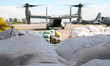 A US Marine Osprey bound for Tacloban waiting to load up with relief goods at Villamor Air...