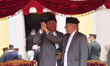 Newly elected Prime Minister of Nepal, Sher Bahadur Deuba shake hand with Formal Prime Min...