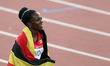 (140802) -- GLASGOW, August 2, 2014 () -- Winnie Nanyondo of Uganda celebrates after the w...