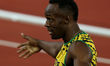 (140802) -- GLASGOW, Aug. 2, 2014 () -- Usian Bolt of Jamaica reacts after the men's 4X100...