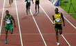 (140802) -- GLASGOW, Aug. 2, 2014 () -- Usian Bolt (R) of Jamaica sprints during the men's...