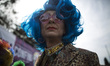 A reveller attends a gay pride parade as part of Roma Pride 2017 in downtown Rome on June...