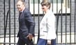 DUP leader Arlene Foster (L) and MP Nigel Dodds arrive at 10 Downing Street on June 13, 20...