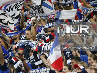 French supporters cheer for their team during the international friendly football match between France and England, on June 13, 2017 at the...